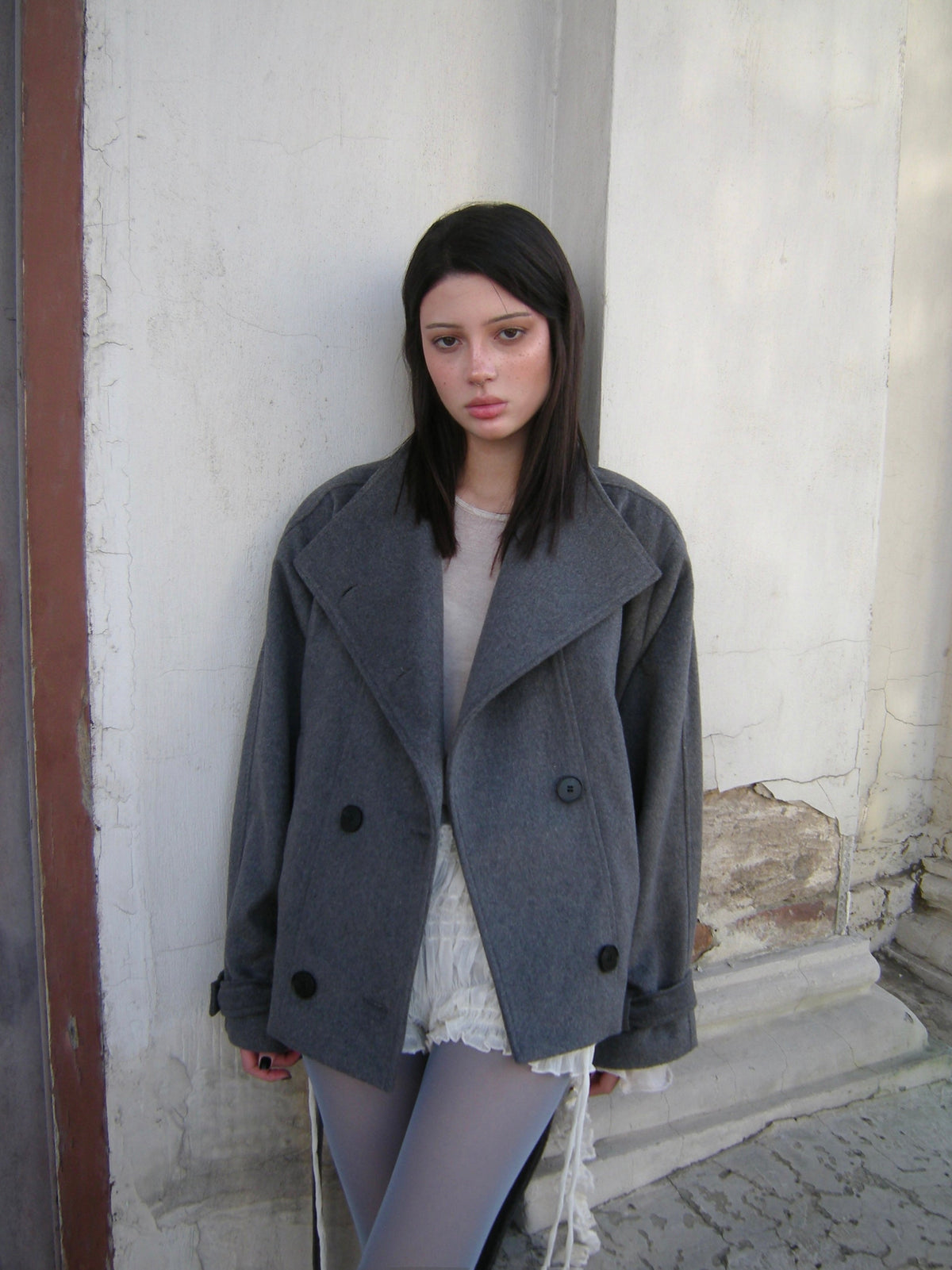 grey double-breasted wool peacoat, worn